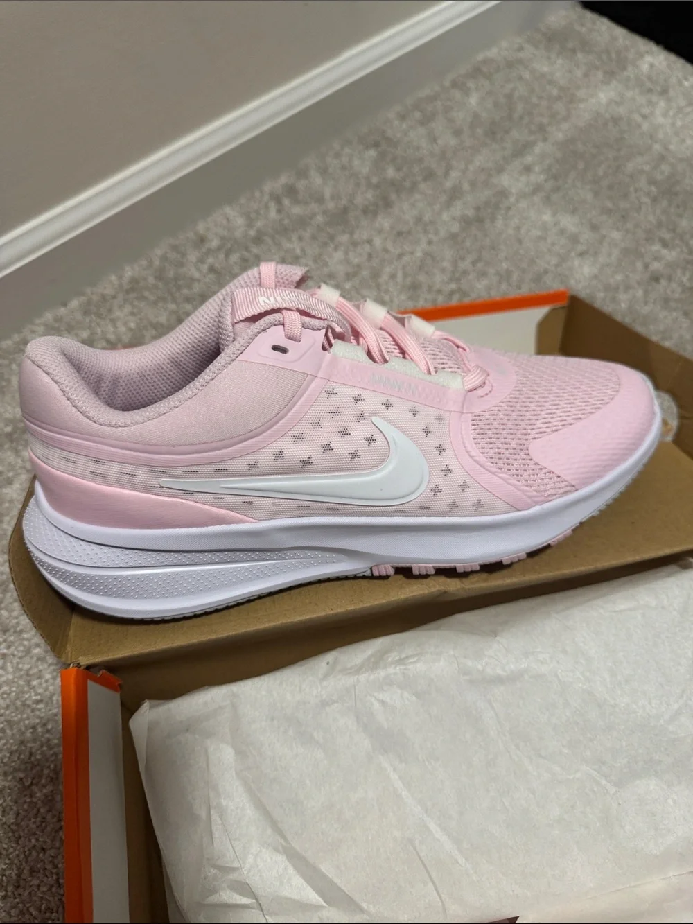 Nike Women’s Light Pink Athletic Sneakers with White Swoosh